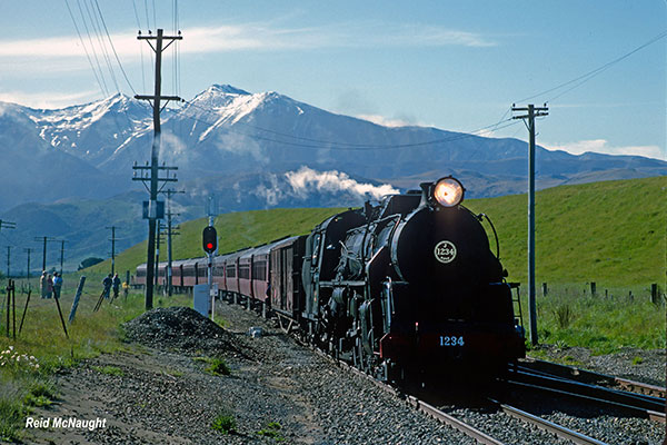 steam loco J1234 with scenic train Nz arriving Springfield